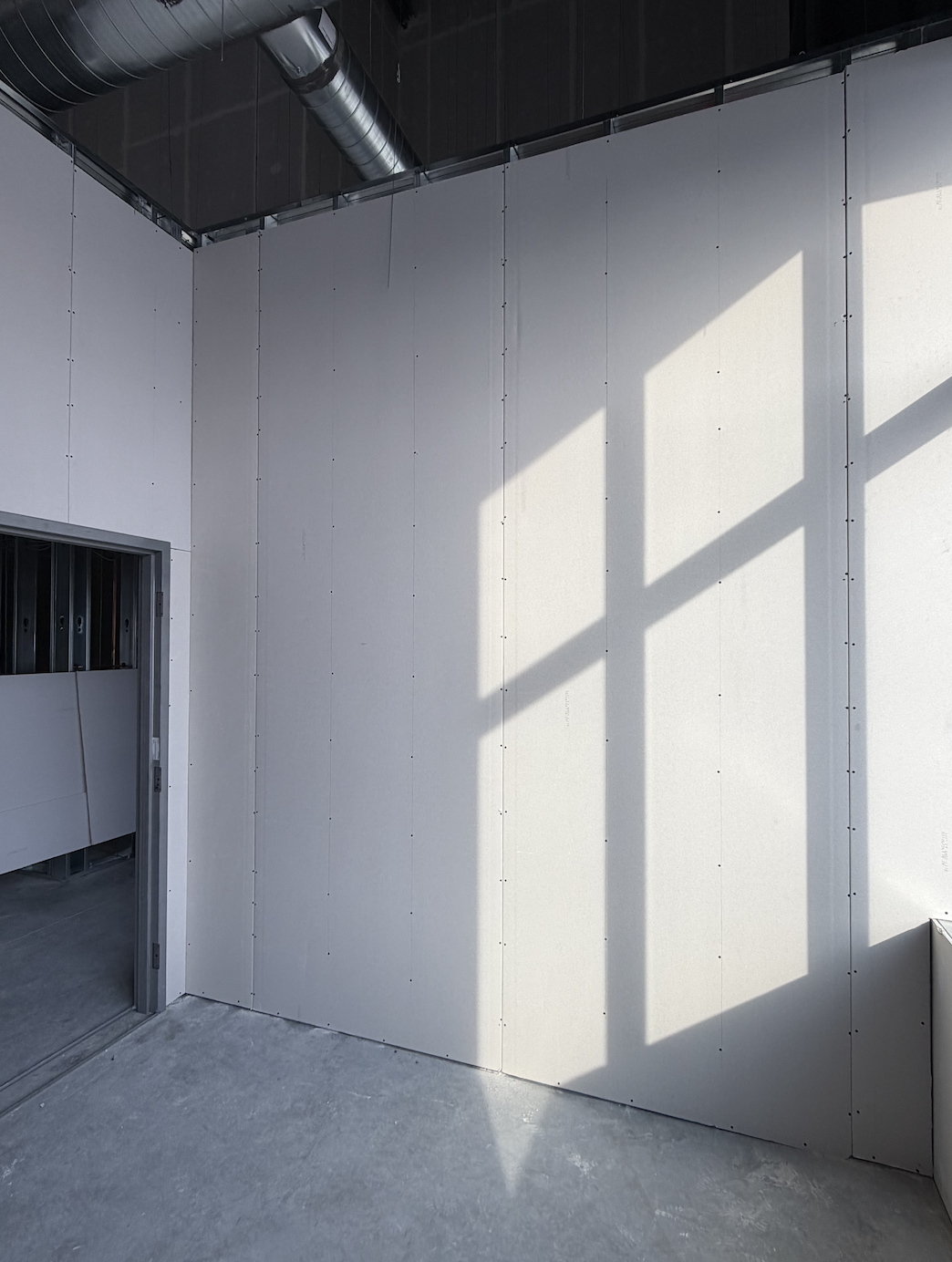 Commercial office drywall partition ready for taping and finishing